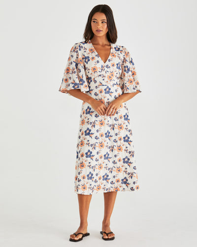 Front view of Luca Dress Floral Embroidery Navy with kimono sleeves 