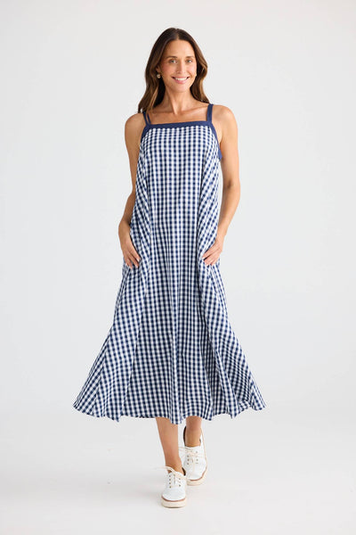 Brave + True Erica Dress Navy Gingham – front view with model wearing white sneakers