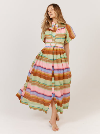 Full-length look of the Fate + Becker Siesta Dress styled with belt, model posing.
