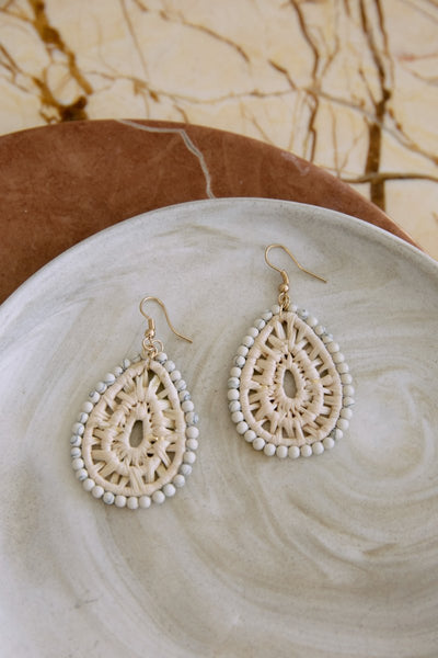 Matera Nature Earrings Raw Drop styled on dish with natural tones