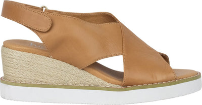 Side view of Mila Coconut Leather Wedge Shoes by Hinako featuring cross-over front straps, woven rope wedge heel, and white EVA sole.