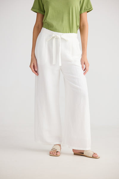 Close up view of white Dickens Pants by Shanty Co. with waist tie