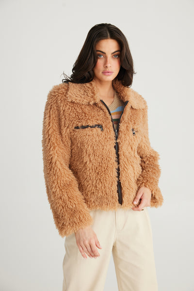 Cyrus Jacket in a biscuit faux shaggy fur. Brand is Talisman