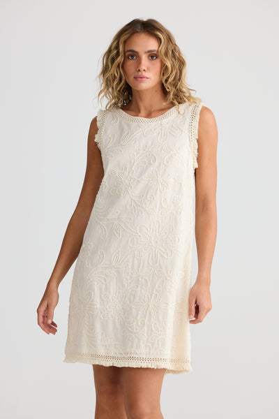 Model wearing Chantilly Dress from Talisman on a plain background