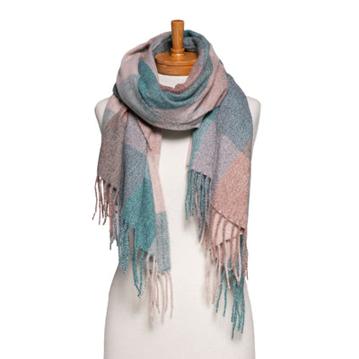 Plaid scarf with pink and green tones on a mannequin against a white background
