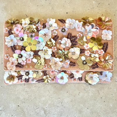 Beaded clutch with peach and gold floral embellishments