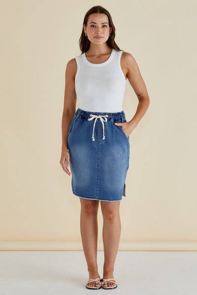 Betty Basics Augie Denim Skirt Denim Blue full front outfit – casual stretch denim skirt with white tank