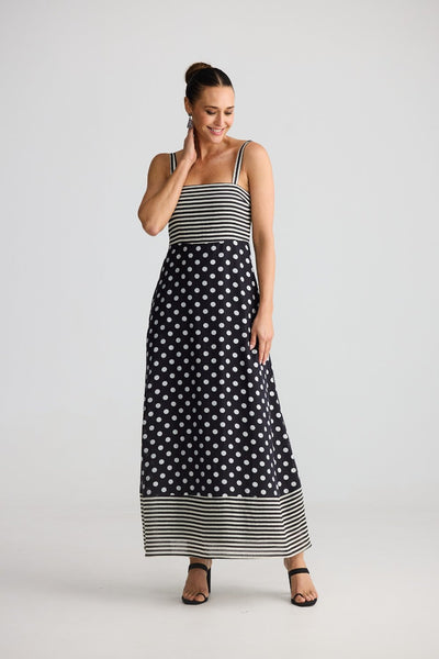 Woman wearing Brave + True Grace Dress in spot and stripe print front view – Binny Bowe Boutique