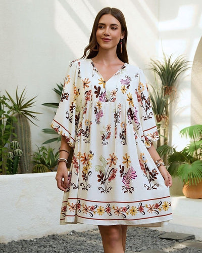 Mutig Floral Puff Sleeve Mini Dress front view with tie-neck detail