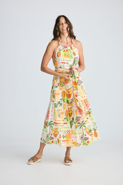 Model wearing the Holiday Pinata Dress Tropical Fiesta print – front view