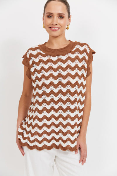 Model wearing Jamaica Knit Top from Haven in brown and white zigzag knit, front view