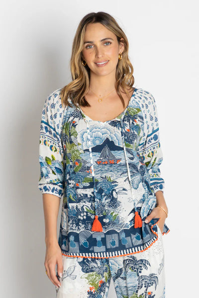 Lulalife Dita Top Ocean front view in vibrant blue green print with tassel detail and worn with matching Dita Pants.