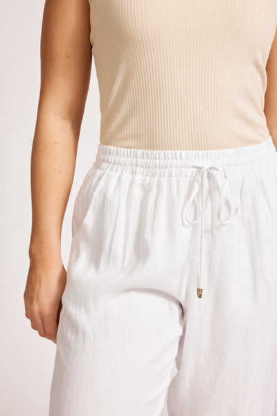 Close-up of waistband and drawstring detail on Eb&Ive Miramar Linen Pants in white