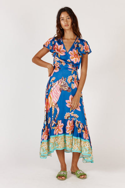 Model wearing Rubyyaya Tango Wrap Dress in blue floral zebra print – front view