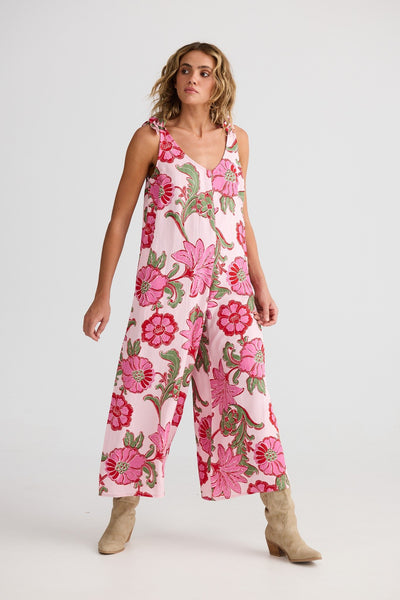 Talisman Temple Jumpsuit Pink Ibiza side view, floral print, relaxed fit, bohemian style.