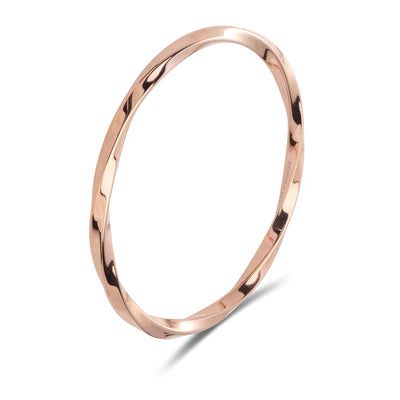 Vogue Twist Bangle in rose gold plated stainless steel, 65mm diameter – elegant women’s jewellery from Binny Bowe Boutique.